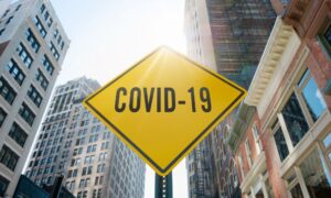 A covid-19 sign in a city